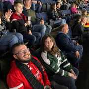 Monroe Environmental employees watching Toledo Walleye game