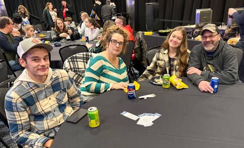 Monroe Environmental employee and family enjoying dinner.