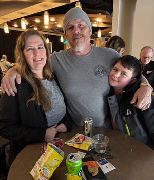 Monroe employee and family ready to enjoy the Toledo Walleyes game